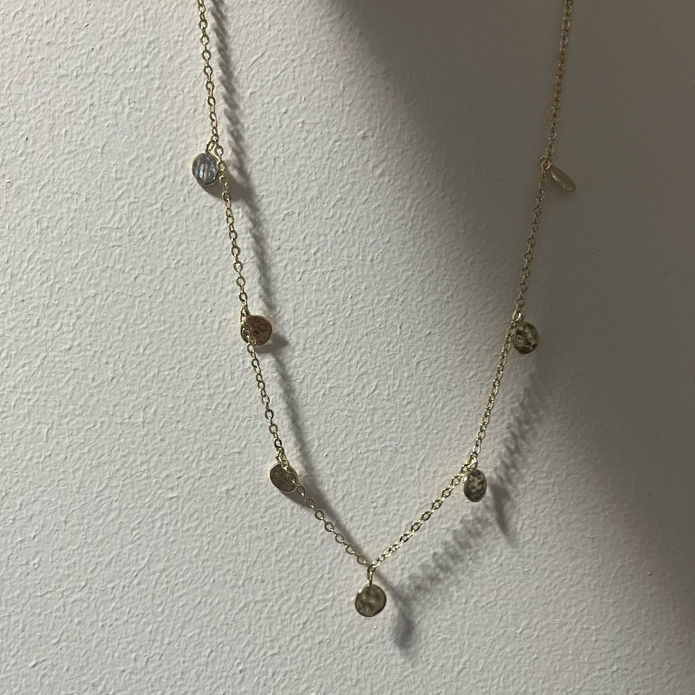 Gold plated disc necklace with extender.
